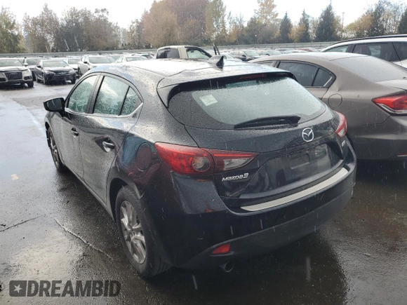 2014 Mazda 3 i Grand Touring with VIN JM1BM1M72E1102296, listed as a Copart auction lot 79222024 with 144,122 mi miles and Salvage Title. Bid and sale history available at DreamBid. Image 2.
