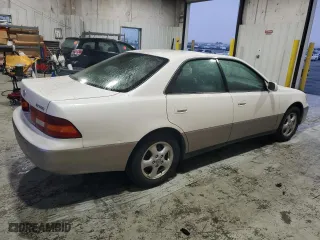 1999 Lexus ES 300 Luxury Sport Sdn with VIN JT8BF28G0X0233986, listed as a Copart auction lot 82440944 with 129,656 mi miles and Salvage Title. Bid and sale history available at carsss.com. Image 3.