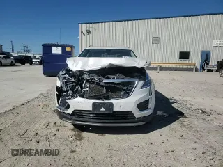 2021 Cadillac XT5 FWD Premium Luxury with VIN 1GYKNCRSXMZ135949, listed as a Copart auction lot 47752805 with 99,838 mi miles and Salvage Title. Bid and sale history available at carsss.com. Image 11.