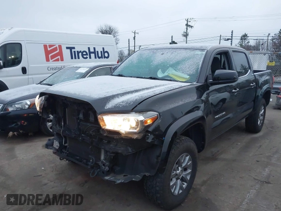 2017 Toyota Tacoma SR5 with VIN 3TMAZ5CN5HM043482, listed as a IAAI auction lot 41613811 with 114,795 mi miles and . Bid and sale history available at carsss.com. Image 2.