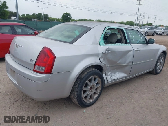 2007 Chrysler 300 Limited with VIN 2C3KK53G57H650056, listed as a IAAI auction lot 42105241 with 200,010 mi miles. Bid and sale history available at carsss.com. Image 4.