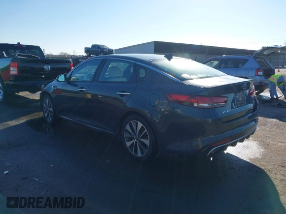 2016 Kia Optima SXL Turbo with VIN 5XXGV4L2XGG051938, listed as a IAAI auction lot 41400484 with 114,722 mi miles. Bid and sale history available at carsss.com. Image 3.