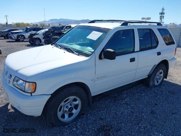 2001 Isuzu Rodeo S with VIN 4S2DM58W214347968, listed as a IAAI auction lot 41871597 with 216,343 mi miles. Bid and sale history available at carsss.com. Image 2.