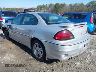 2003 Pontiac Grand Am GT with VIN 1G2NW52E13M612218, listed as a IAAI auction lot 41478495 with 242,179 mi miles. Bid and sale history available at carsss.com. Image 3.