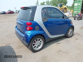 2008 Smart fortwo Pure z VIN WMEEJ31X88K195623, wystawiony jako IAAI lot #42470738 z przebiegiem 123 494 mil mil oraz . Historia ofert i sprzedaży dostępna na DreamBid. Obrazek 4.