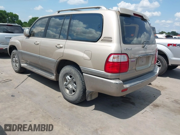 2001 Lexus LX 470 with VIN JTJHT00W713511796, listed as a IAAI auction lot 42222574 with 297,427 mi miles and . Bid and sale history available at carsss.com. Image 3.