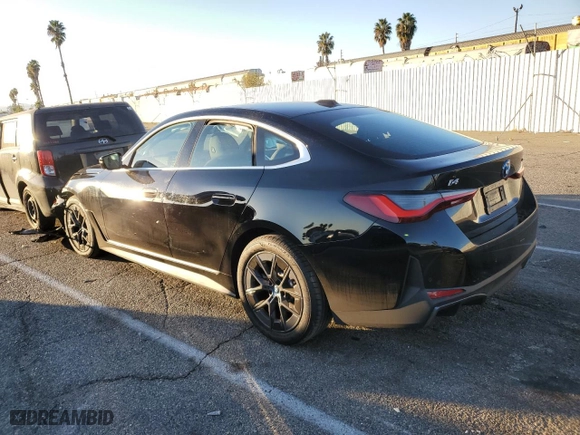 2024 BMW i4 xDrive40 with VIN WBY83FB01RFT07809, listed as a Copart auction lot 79956674 with NaN miles and Salvage Title. Bid and sale history available at carsss.com. Image 2.