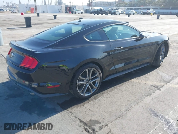 2018 Ford Mustang EcoBoost z VIN 1FA6P8TH4J5104877, wystawiony jako IAAI lot #42188807 z przebiegiem 60 967 mil mil oraz . Historia ofert i sprzedaży dostępna na DreamBid. Obrazek 4.