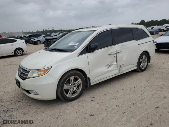 2013 Honda Odyssey Touring with VIN 5FNRL5H92DB074851, listed as a Copart auction lot 51618995 with 165,250 mi miles and Salvage Title. Bid and sale history available at carsss.com. Image 1.