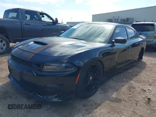 2019 Dodge Charger R/T with VIN 2C3CDXCT2KH575297, listed as a IAAI auction lot 41661339 with 119,854 mi miles and . Bid and sale history available at DreamBid. Image 20.