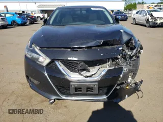 2017 Nissan Maxima SL with VIN 1N4AA6AP9HC434613, listed as a Copart auction lot 57560025 with 99,433 mi miles and Salvage title. Bid and sale history available at DreamBid. Image 5.