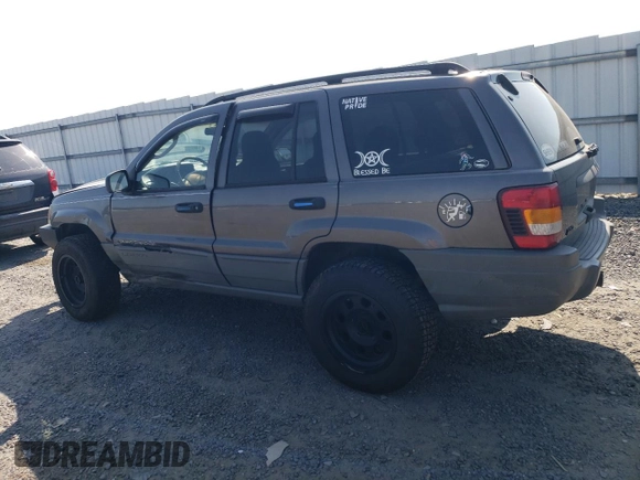 2002 Jeep Grand Cherokee Laredo с VIN 1J8GW48S22C206165, выставлен на аукционе Copart как лот 62193315 с пробегом 186 544 миль миль и Чистый • Clean title. История ставок и продаж доступна на DreamBid. Изображение 2.