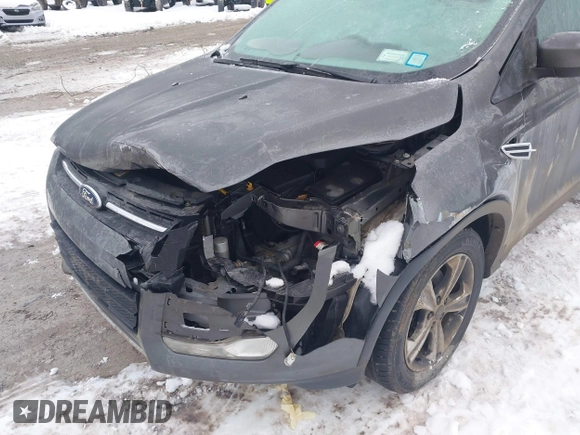 2015 Ford Escape SE with VIN 1FMCU9G90FUB35065, listed as a IAAI auction lot 41165956 with 131,485 mi miles. Bid and sale history available at carsss.com. Image 13.