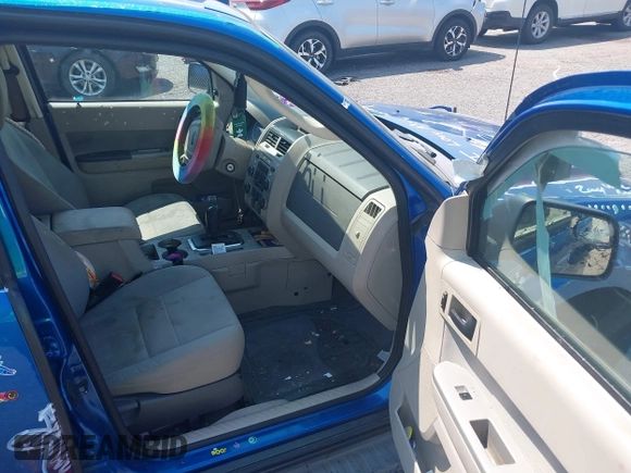 2011 Ford Escape XLT with VIN 1FMCU9D70BKA12908, listed as a IAAI auction lot 42425419 with 286,179 mi miles and . Bid and sale history available at DreamBid. Image 5.