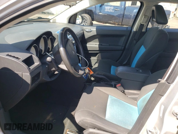 2009 Dodge Caliber R/T z VIN 1B3HB78B49D168677, wystawiony jako Copart lot #58051655 z przebiegiem 104 860 mil mil oraz Szkoda całkowita • Salvage title. Historia ofert i sprzedaży dostępna na DreamBid. Obrazek 7.