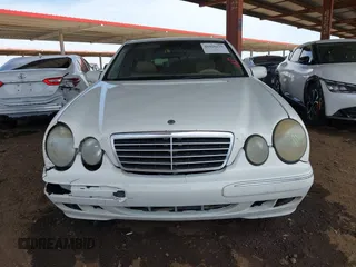 2001 Mercedes-Benz E-Class with VIN WDBJF65J61B183965, listed as a IAAI auction lot 41926279 with 305,436 mi miles. Bid and sale history available at carsss.com. Image 12.