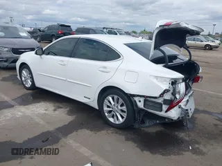 2014 Lexus ES 300h with VIN JTHBW1GG5E2064531, listed as a IAAI auction lot 42119900 with 210,354 mi miles and . Bid and sale history available at DreamBid. Image 3.