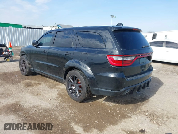 2019 Dodge Durango SRT with VIN 1C4SDJGJ2KC550562, listed as a IAAI auction lot 41549390 with 51,217 mi miles and . Bid and sale history available at DreamBid. Image 3.
