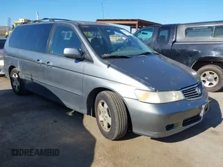 2001 Honda Odyssey EX z VIN 2HKRL18661H525176, wystawiony jako IAAI lot #42149423 z przebiegiem 179 016 mil mil oraz . Historia ofert i sprzedaży dostępna na DreamBid. Obrazek 1.