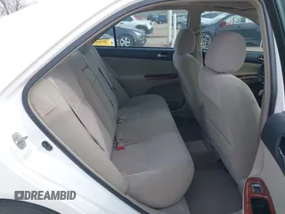 2003 Toyota Camry LE with VIN 4T1BE32K13U250477, listed as a IAAI auction lot 41996101 with 212,951 mi miles and . Bid and sale history available at DreamBid. Image 8.