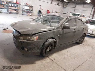2009 Mitsubishi Lancer GTS with VIN JA3AU86W39U033534, listed as a IAAI auction lot 41729480 with 124898 miles. Bid and sale history available at carsss.com. Image 18.