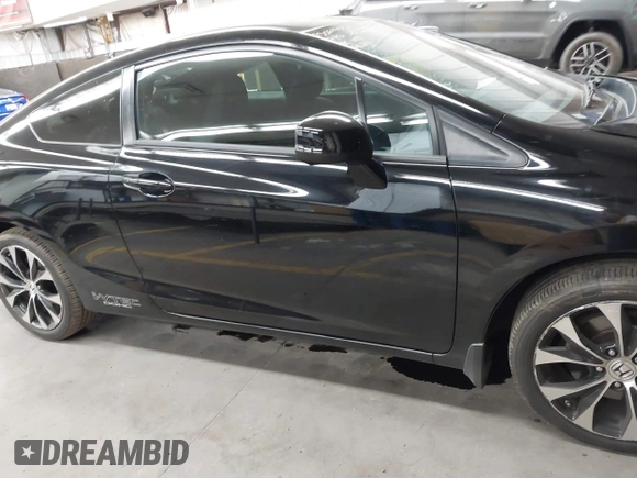 2013 Honda Civic Si with VIN 2HGFG4A52DH702024, listed as a IAAI auction lot 42527107 with 76,752 mi miles and . Bid and sale history available at DreamBid. Image 14.