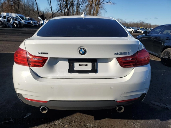 2016 BMW 4 Series 435i xDrive z VIN WBA4B3C59GG529000, wystawiony jako Copart lot #86324874 z przebiegiem 91 626 mil mil oraz Szkoda całkowita • Salvage title. Historia ofert i sprzedaży dostępna na DreamBid. Obrazek 6.