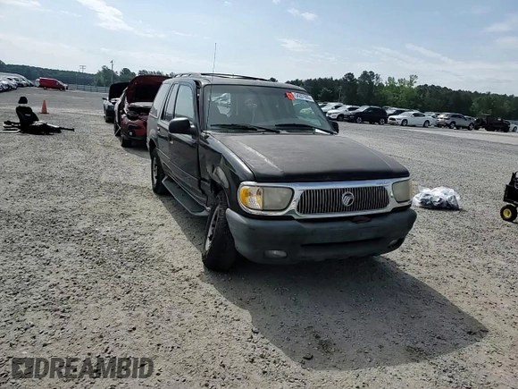 2001 Mercury Mountaineer z VIN 4M2ZU66E41UJ02651, wystawiony jako Copart lot #54207905 z przebiegiem 294 148 mil mil oraz Szkoda całkowita • Salvage title. Historia ofert i sprzedaży dostępna na DreamBid. Obrazek 14.