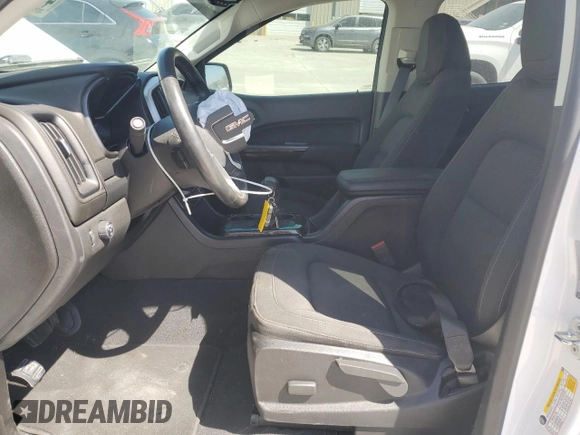 2021 GMC Canyon 2WD Elevation with VIN 1GTG5CENXM1293587, listed as a Copart auction lot 48582395 with 18,708 mi miles and Salvage title. Bid and sale history available at DreamBid. Image 7.