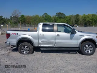 2013 Ford F-150 XL with VIN 1FTFW1ET0DFC85741, listed as a IAAI auction lot 42022221 with 156,509 mi miles. Bid and sale history available at carsss.com. Image 13.