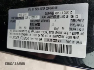 2015 Mazda 5 Sport with VIN JM1CW2BLXF0184094, listed as a Copart auction lot 56618405 with 98,757 mi miles and Salvage title. Bid and sale history available at DreamBid. Image 12.