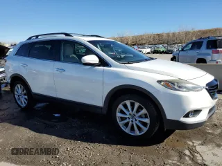 2015 Mazda CX-9 Grand Touring с VIN JM3TB2DA1F0462203, выставлен на аукционе Copart как лот 37073714 с пробегом 101 293 миль миль и Списание • Salvage title. История ставок и продаж доступна на DreamBid. Изображение 4.