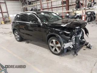 2019 Mercedes-Benz GLC with VIN WDC0G4KB1KV171258, listed as a IAAI auction lot 41895553 with 77,363 mi miles. Bid and sale history available at carsss.com. Image 1.