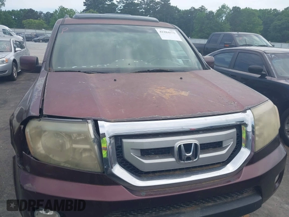 2011 Honda Pilot EX-L z VIN 5FNYF4H71BB006081, wystawiony jako IAAI lot #42284575 z przebiegiem 252 844 mil mil oraz . Historia ofert i sprzedaży dostępna na DreamBid. Obrazek 12.