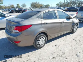 2014 Hyundai Accent GLS with VIN KMHCT4AE6EU639694, listed as a IAAI auction lot 41674605 with 101,549 mi miles and . Bid and sale history available at carsss.com. Image 4.