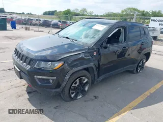 2017 Jeep Compass Trailhawk z VIN 3C4NJDDB6HT631047, wystawiony jako IAAI lot #42457508 z przebiegiem 59 414 mil mil oraz . Historia ofert i sprzedaży dostępna na DreamBid. Obrazek 2.