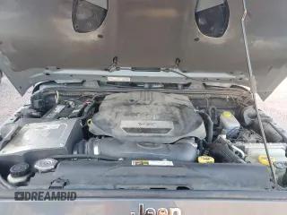 2014 Jeep Wrangler Unlimited Rubicon with VIN 1C4HJWFG9EL199501, listed as a Copart auction lot 61443595 with 86,940 mi miles and Salvage title. Bid and sale history available at DreamBid. Image 11.