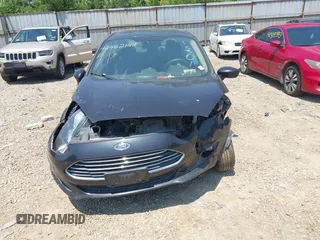 2015 Ford Fiesta S with VIN 3FADP4AJ0FM133011, listed as a IAAI auction lot 42462148 with 85,517 mi miles and . Bid and sale history available at DreamBid. Image 13.