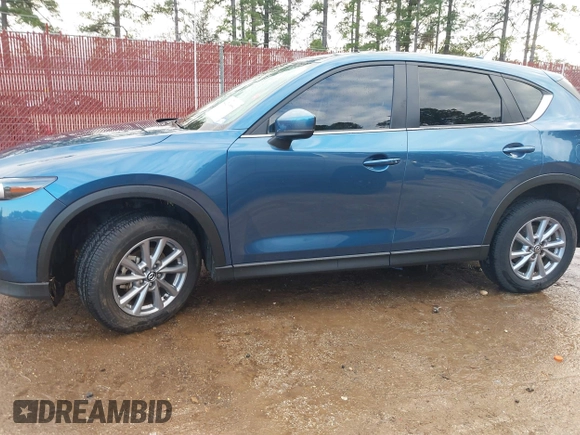 2023 Mazda CX-5 2.5 S Carbon Edition with VIN JM3KFBCM2P0235177, listed as a IAAI auction lot 41209889 with 15,588 mi miles. Bid and sale history available at carsss.com. Image 14.
