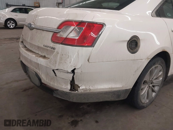 2011 Ford Taurus Limited z VIN 1FAHP2FW8BG185274, wystawiony jako IAAI lot #41681899 z przebiegiem 196 048 mil mil oraz . Historia ofert i sprzedaży dostępna na DreamBid. Obrazek 13.