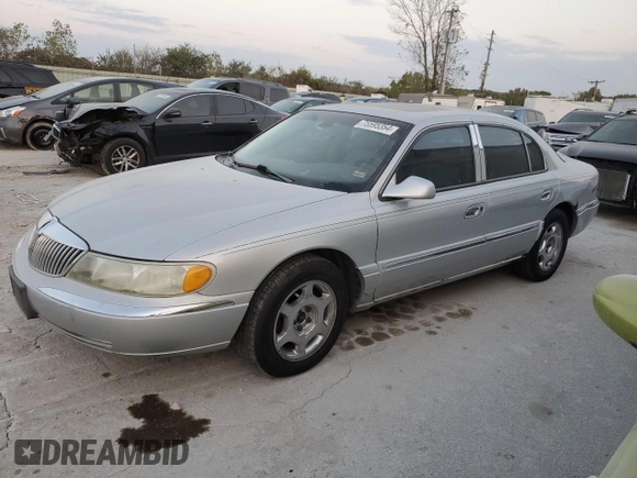 2002 Lincoln Continental with VIN 1LNHM97VX2Y672516, listed as a Copart auction lot 75595354 with 154,361 mi miles and Salvage Title. Bid and sale history available at carsss.com. Image 1.