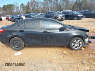 2016 Toyota Corolla L z VIN 5YFBURHE1GP398787, wystawiony jako IAAI lot #41667240 z przebiegiem 128 144 mil mil oraz . Historia ofert i sprzedaży dostępna na DreamBid. Obrazek 13.