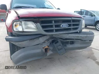 2003 Ford F-150 XL with VIN 1FTRX17213NB65093, listed as a IAAI auction lot 41568065 with 286,293 mi miles. Bid and sale history available at carsss.com. Image 6.