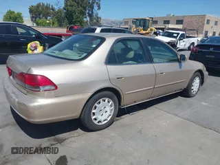 2001 Honda Accord EX z VIN 1HGCG66861A114106, wystawiony jako IAAI lot #42385834 z przebiegiem 172 395 mil mil oraz . Historia ofert i sprzedaży dostępna na DreamBid. Obrazek 4.