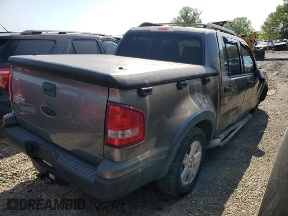 2007 Ford Explorer Sport Trac XLT z VIN 1FMEU31K77UA13757, wystawiony jako Copart lot #53308795 z przebiegiem 205 761 mil mil oraz Czysty tytuł • Clean title. Historia ofert i sprzedaży dostępna na DreamBid. Obrazek 3.