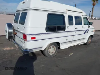 1995 Chevrolet Chevy Van z VIN 1GBEG25K5SF131291, wystawiony jako IAAI lot #41861888 z przebiegiem 90 365 mil mil oraz . Historia ofert i sprzedaży dostępna na DreamBid. Obrazek 4.