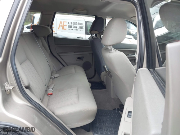 2005 Jeep Grand Cherokee Laredo with VIN 1J4GR48K35C510327, listed as a IAAI auction lot 42026081 with 260,377 mi miles. Bid and sale history available at carsss.com. Image 8.
