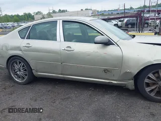 2006 Infiniti M Sport z VIN JNKBY01E06M207564, wystawiony jako IAAI lot #42384952 z przebiegiem 189 804 mil mil oraz . Historia ofert i sprzedaży dostępna na DreamBid. Obrazek 13.