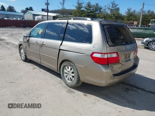 2006 Honda Odyssey EX z VIN 5FNRL384X6B459148, wystawiony jako IAAI lot #41747616 z przebiegiem 158 995 mil mil oraz . Historia ofert i sprzedaży dostępna na DreamBid. Obrazek 3.