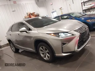 2018 Lexus RX 350 with VIN 2T2BZMCA7JC163886, listed as a IAAI auction lot 42248863 with 57,319 mi miles and . Bid and sale history available at DreamBid. Image 14.